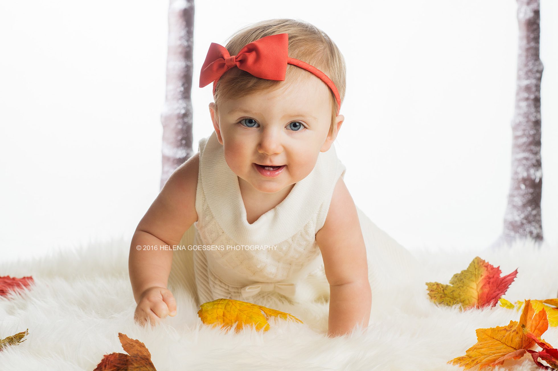 baby girl with orange bowtie