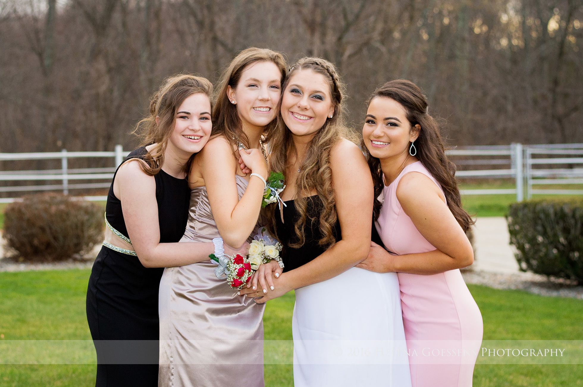 Four girls in prom dresses
