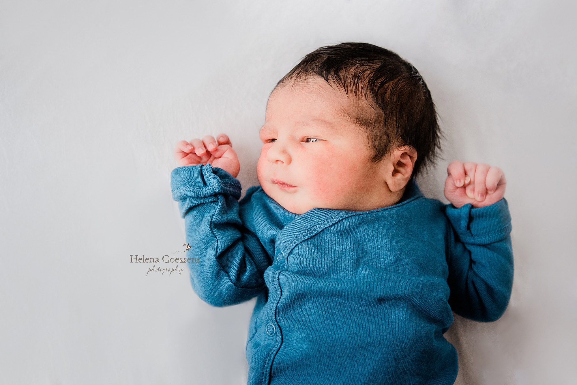 Baby boy during hospital newborn session with Boston newborn photographer Helena Goessens Photography