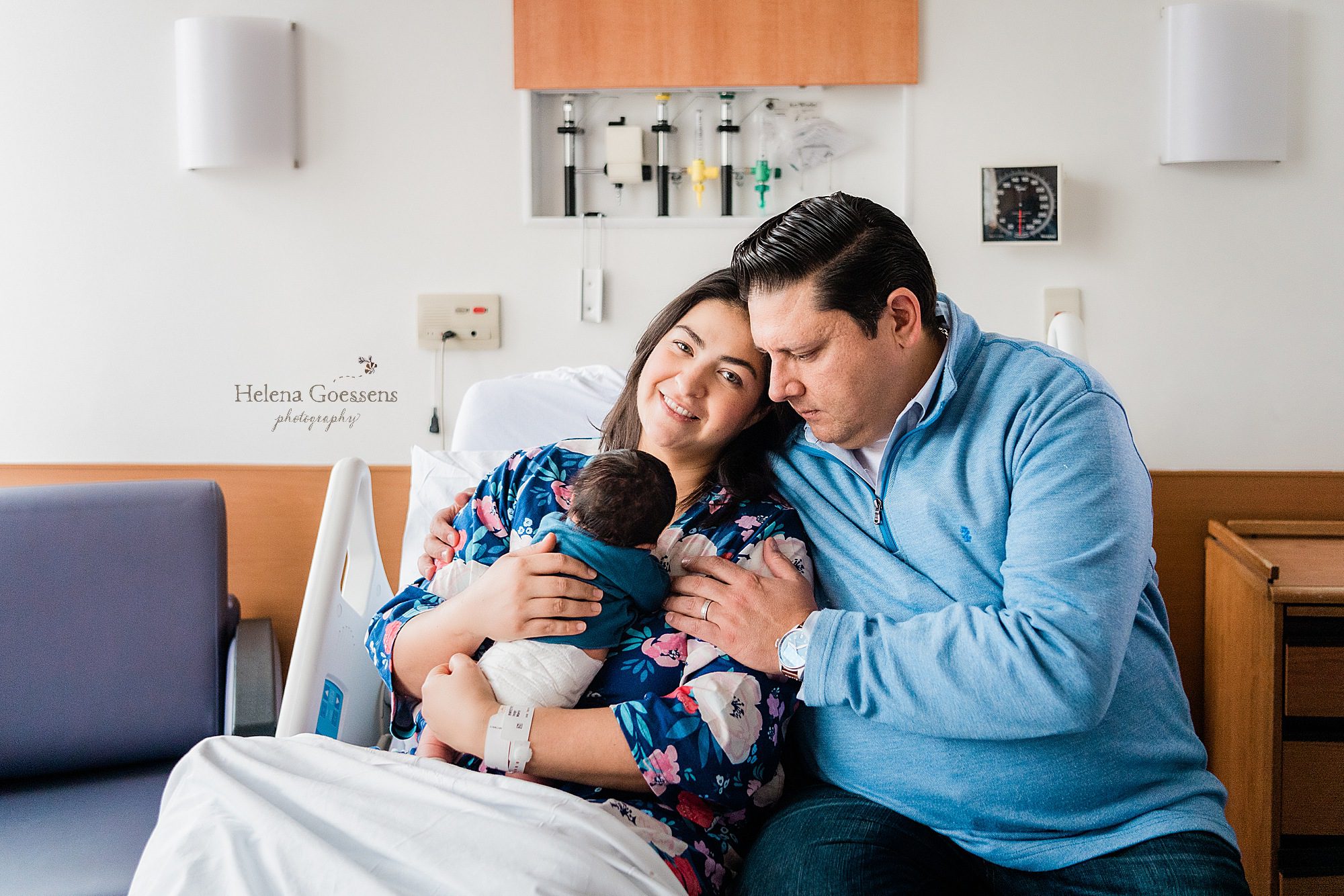 family smiles at hospital with Boston newborn photographer Helena Goessens Photography