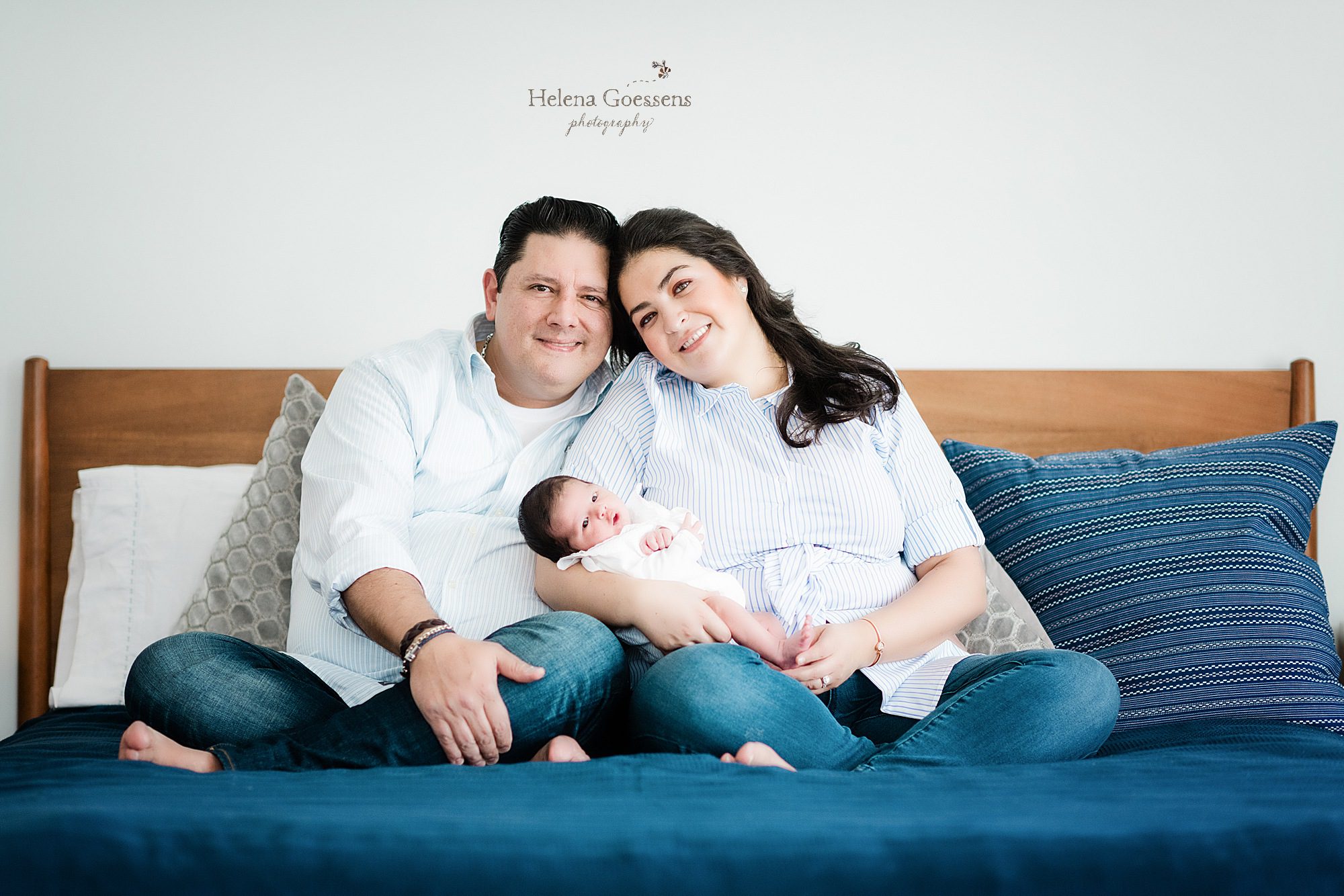 new parents and their baby boy during in home lifestyle session with newborn photographer Helena Goessens Photography