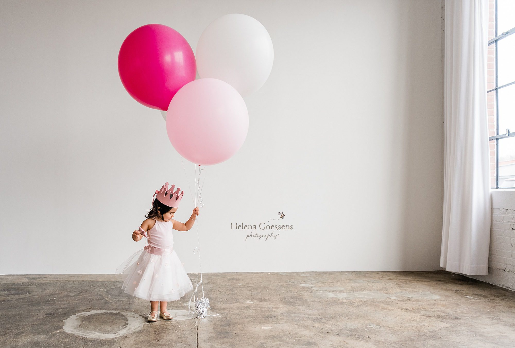 big sister plays with balloons after maternity session with MA maternity photographer Helena Goessens Photography