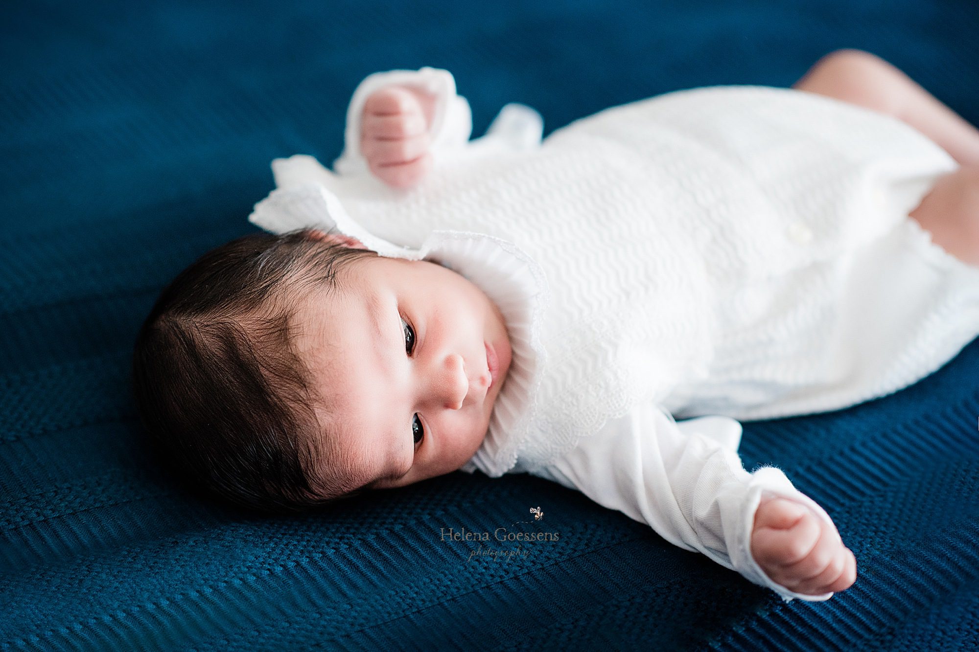 newborn baby boy during lifestyle session at home with Boston MA newborn photographer Helena Goessens Photography
