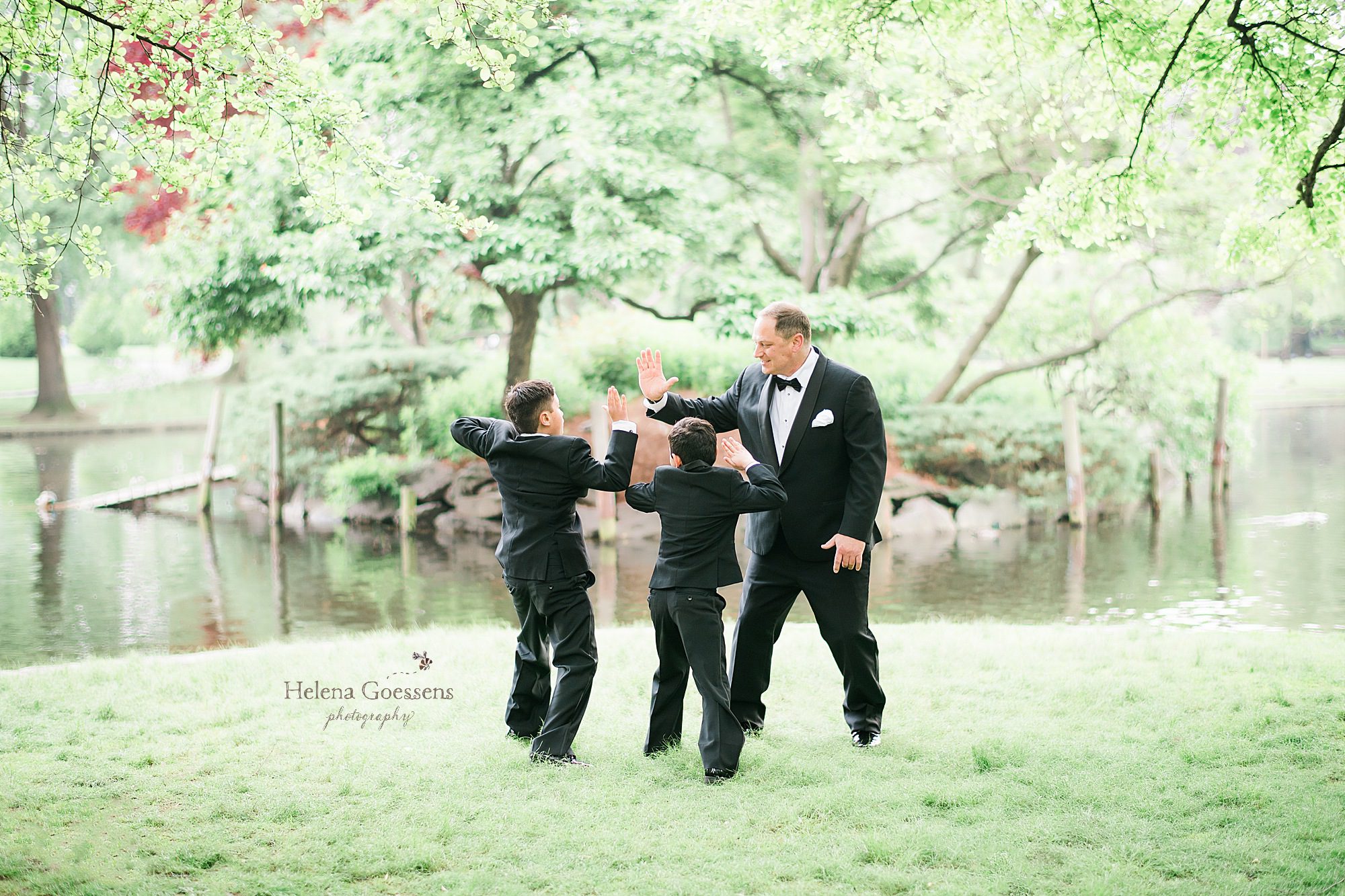 father and sons in Boston Public Garden by Helena Goessens Photography