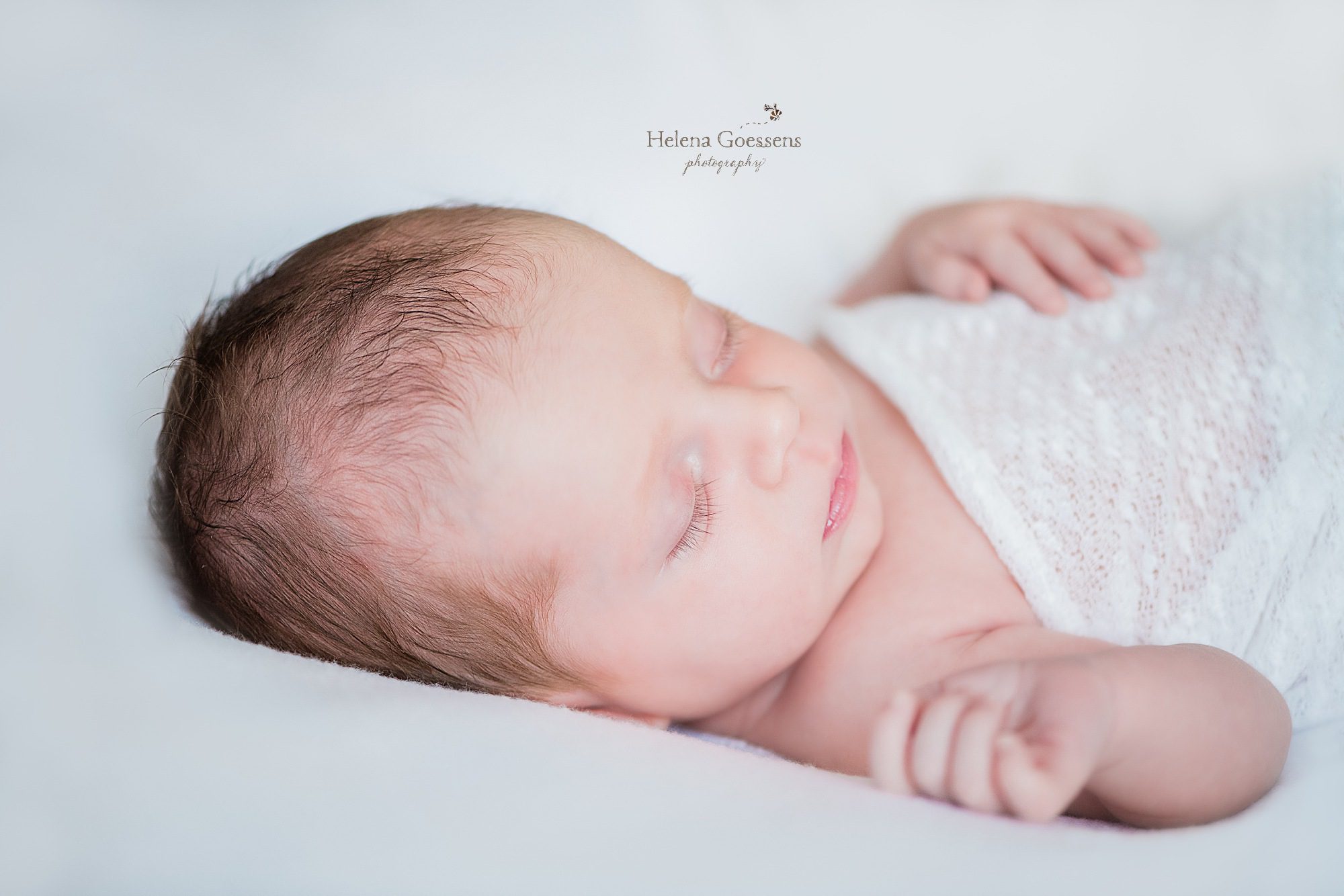 Helena Goessens Photography photographs lifestyle newborn portraits with Boston MA family