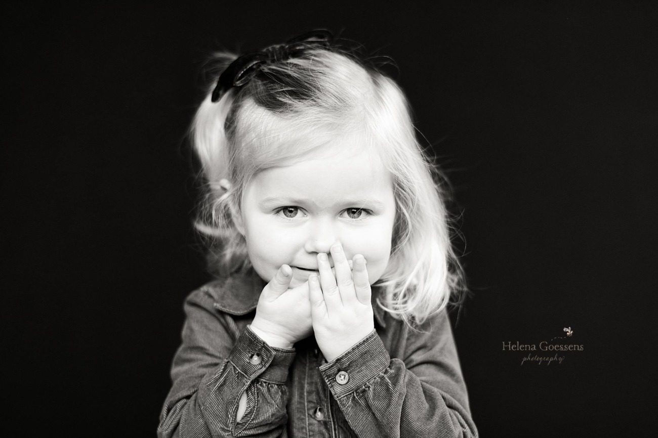 Helena Goessens Photography captures little girl giggling during preschool photos in South Boston