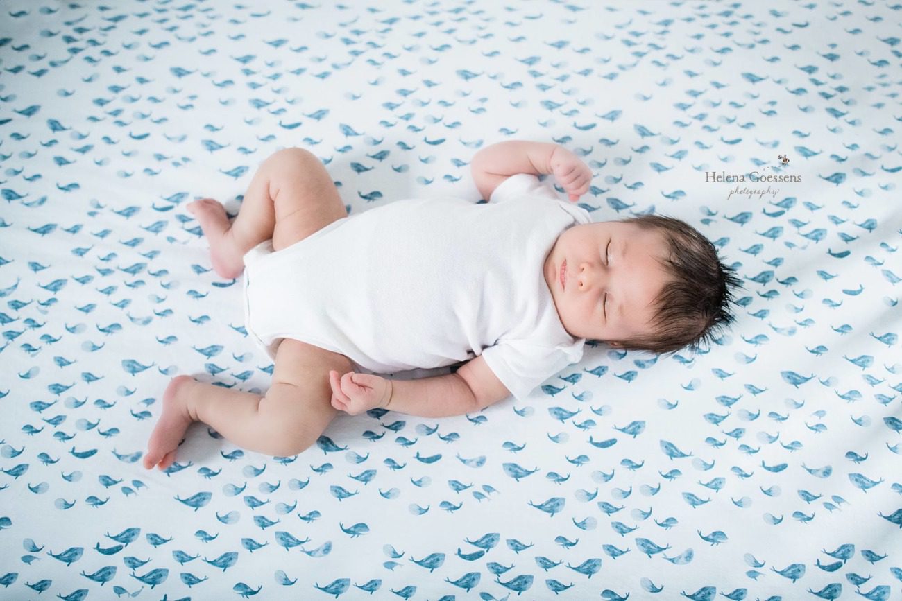 Helena Goessens Photography captures baby boy during newborn lifestyle session
