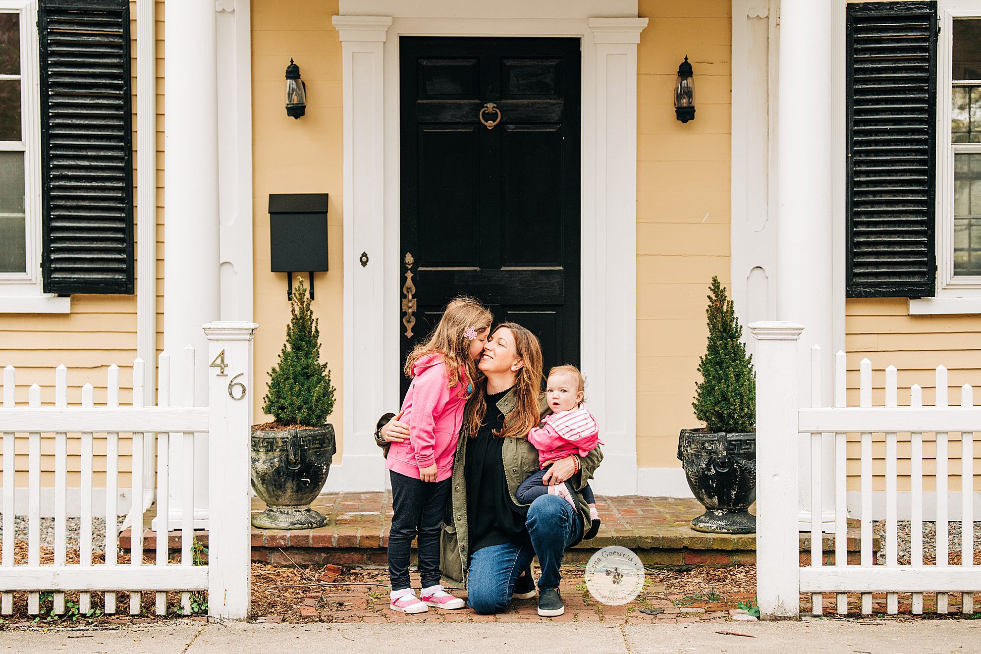 mom and daughters pose for Helena Goessens Photography during Front Steps Project