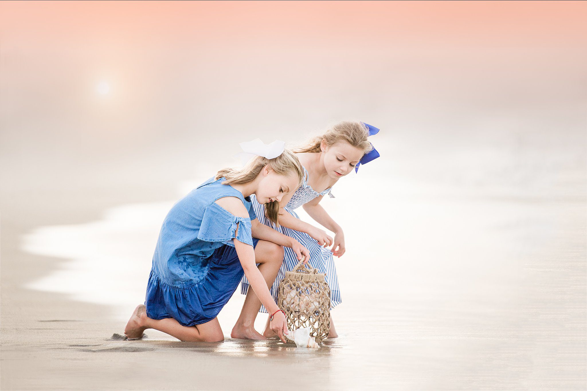 girls play on beach photographed by MA family photographer Helena Goessens Photography