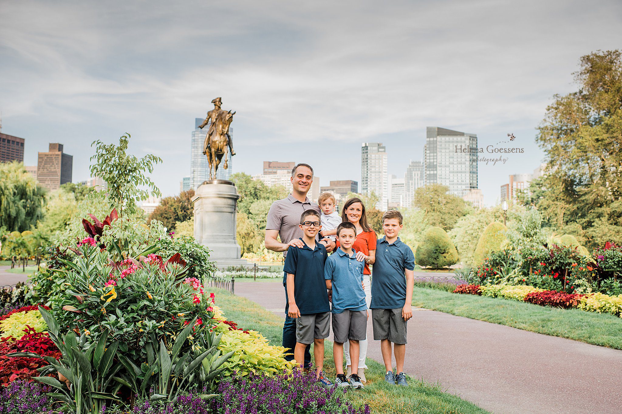 family of 6 poses in Boston Public Garden with Helena Goessens Photography