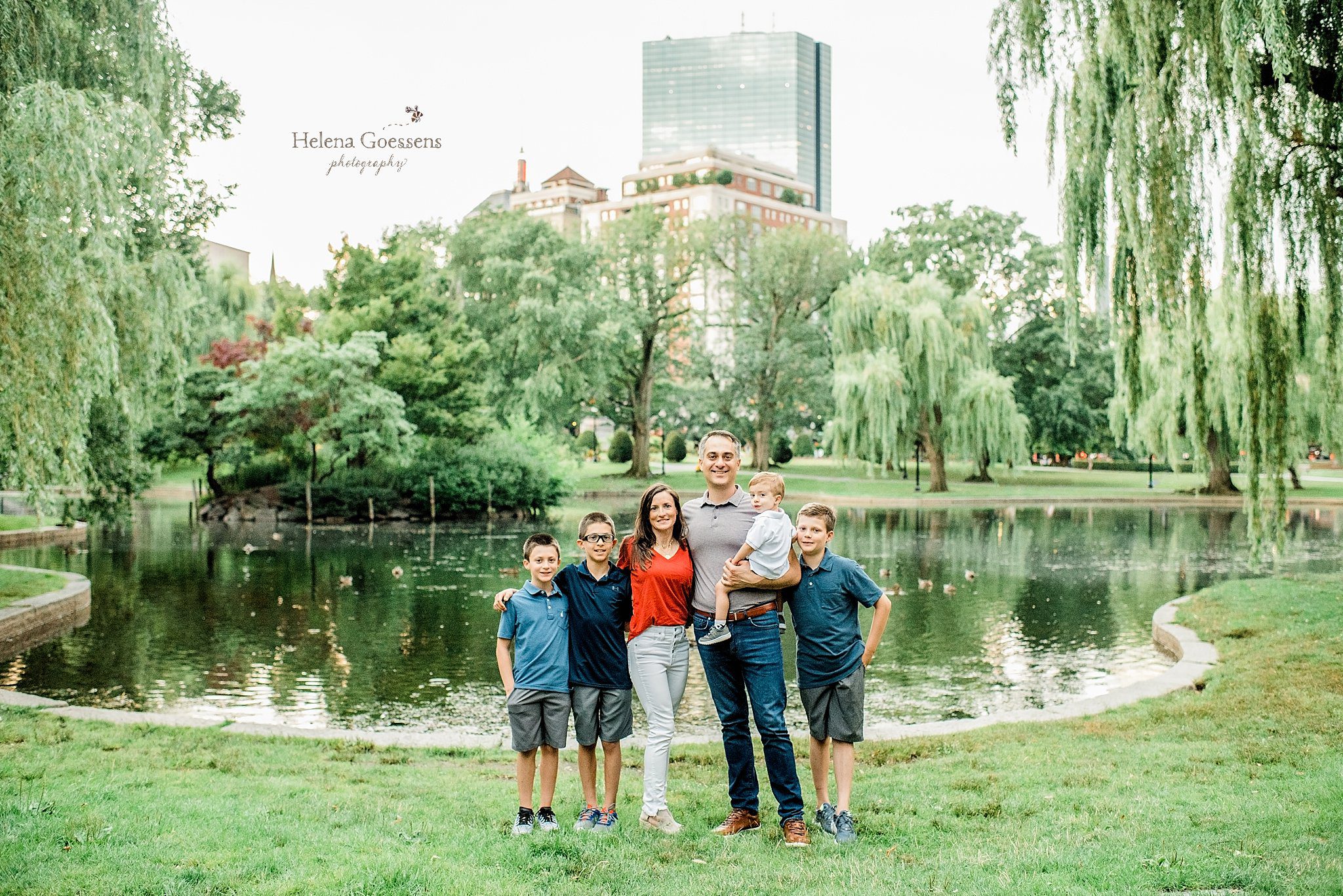 family of 6 poses by pond in Boston Public Garden with Helena Goessens Photography