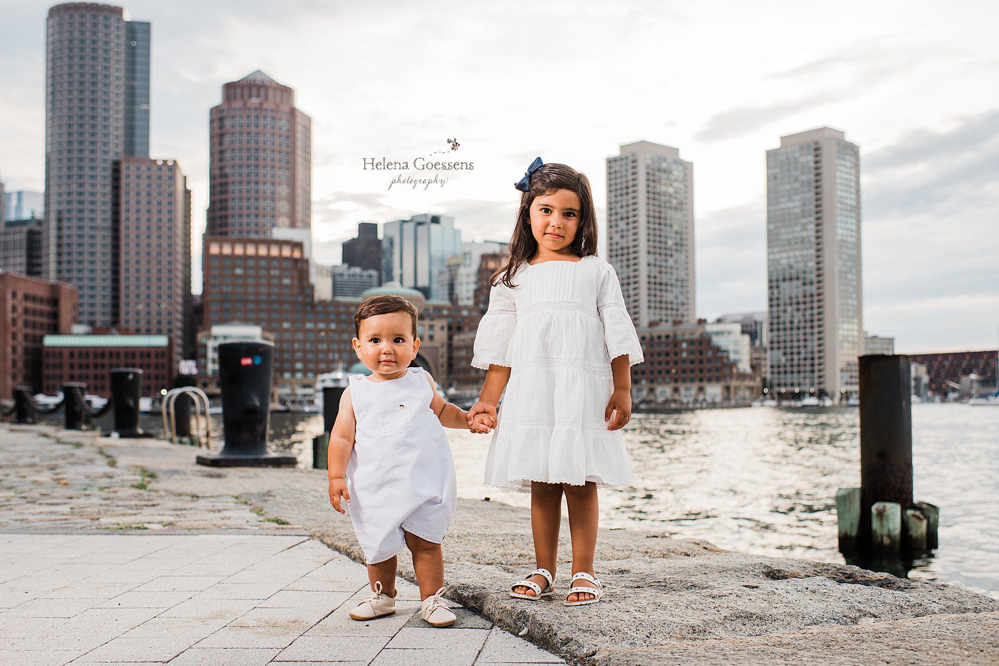 children hold hands during Fan Pier Boston Family Session with Helena Goessens Photography