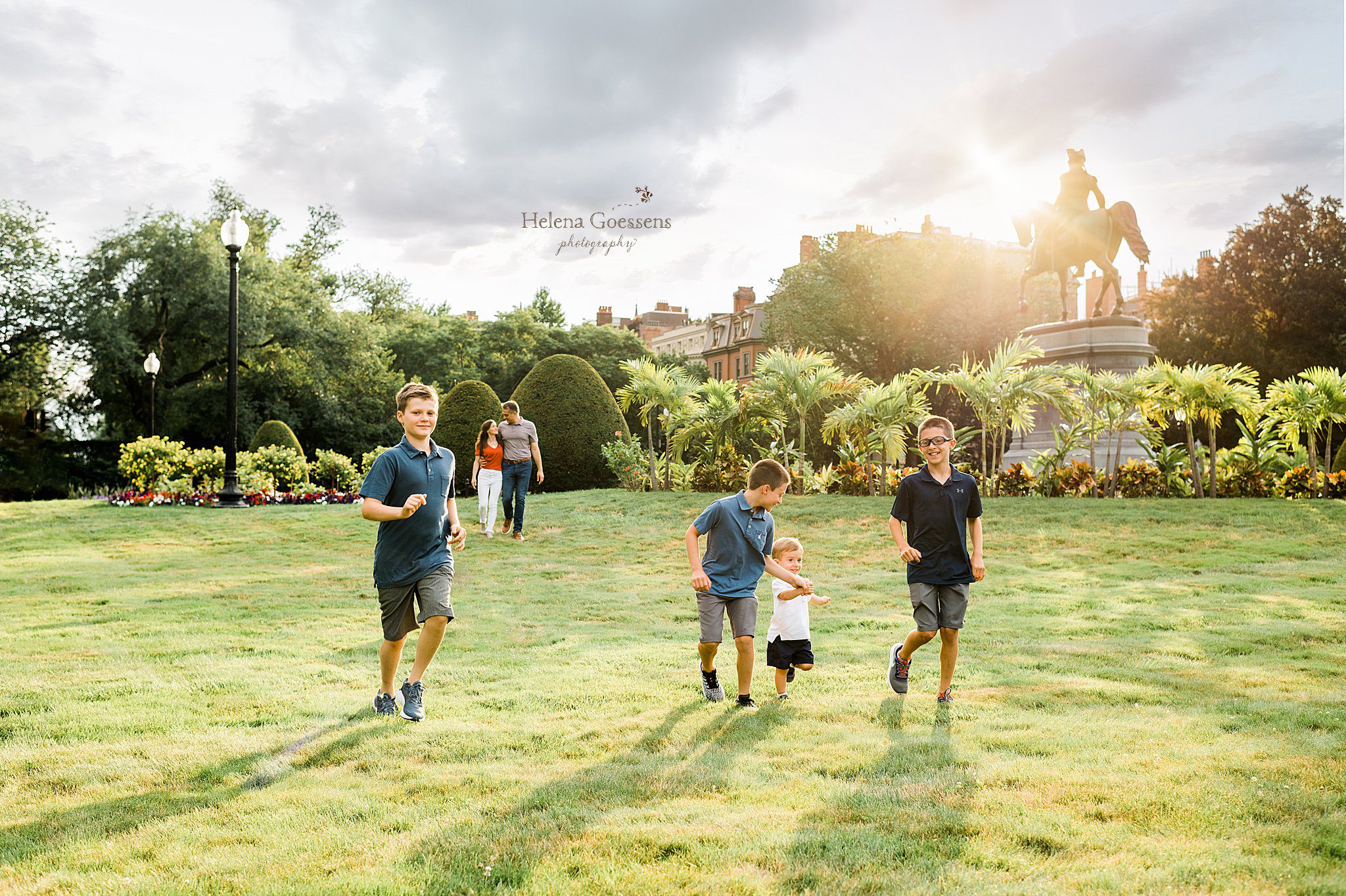 four boys run through gardens of Boston with Helena Goessens Photography