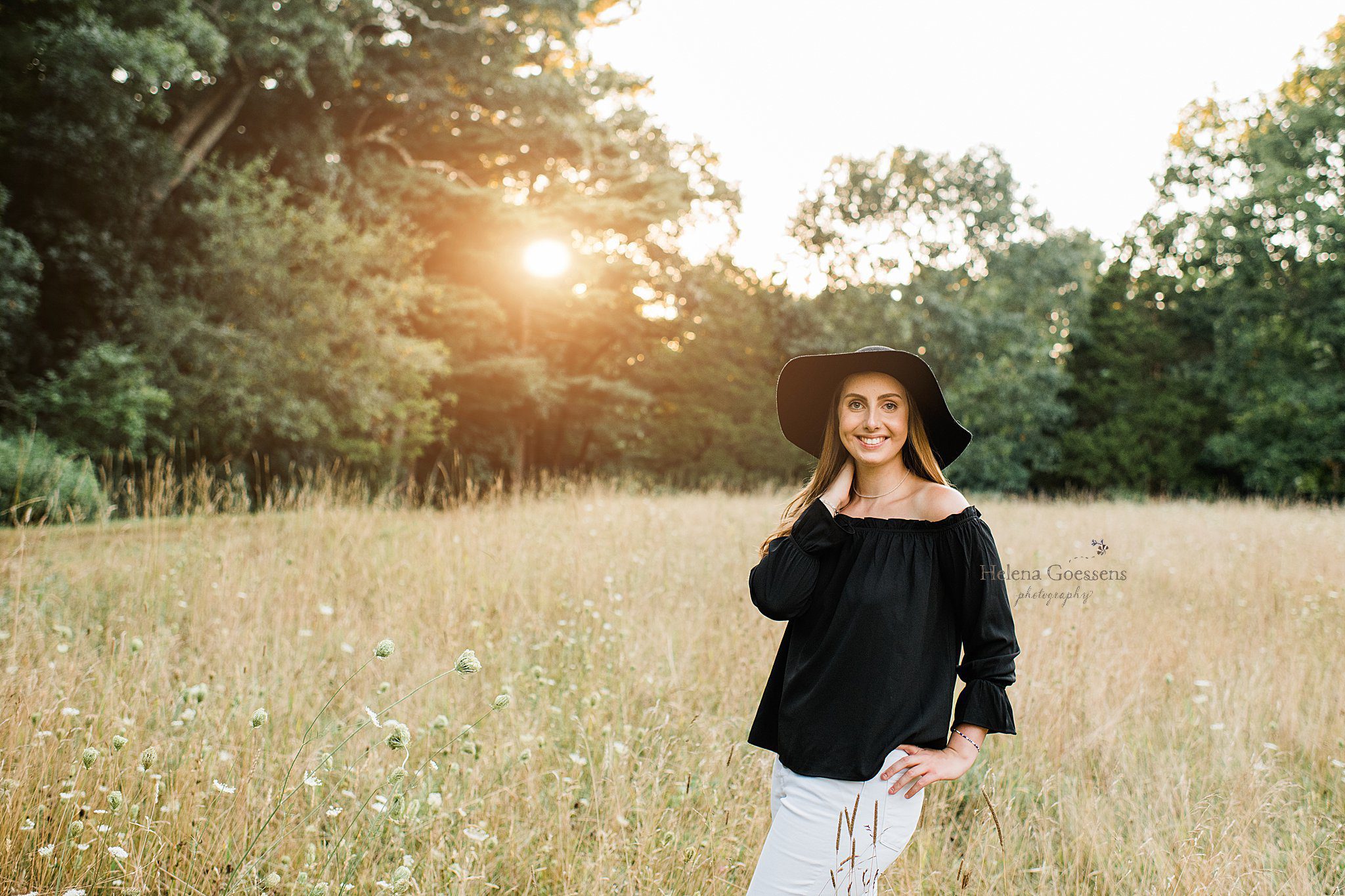 senior portraits in field at Bradley Estate with Helena Goessens Photography