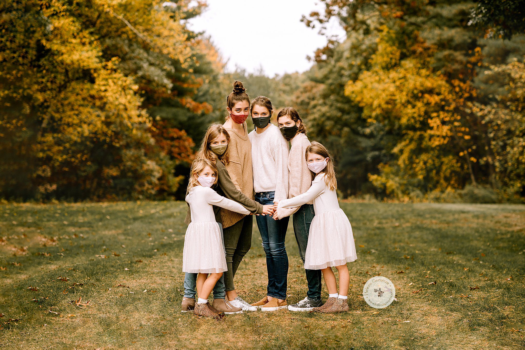 Helena Goessens Photography photographs cousins wearing masks during Canton MA family session