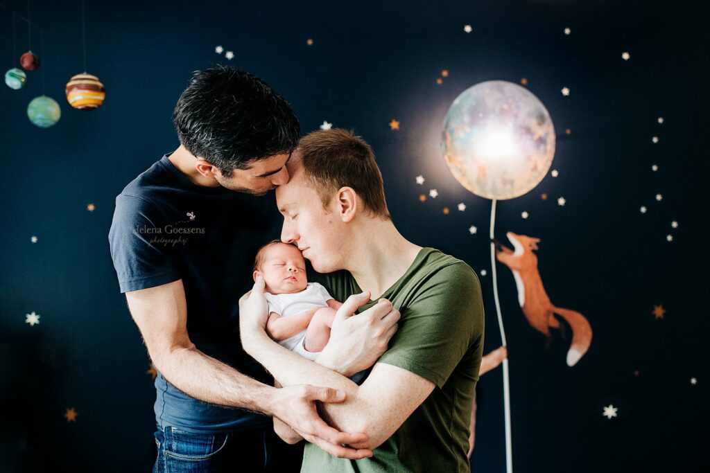 Helena Goessens Photography photographs dads holding newborn baby boy