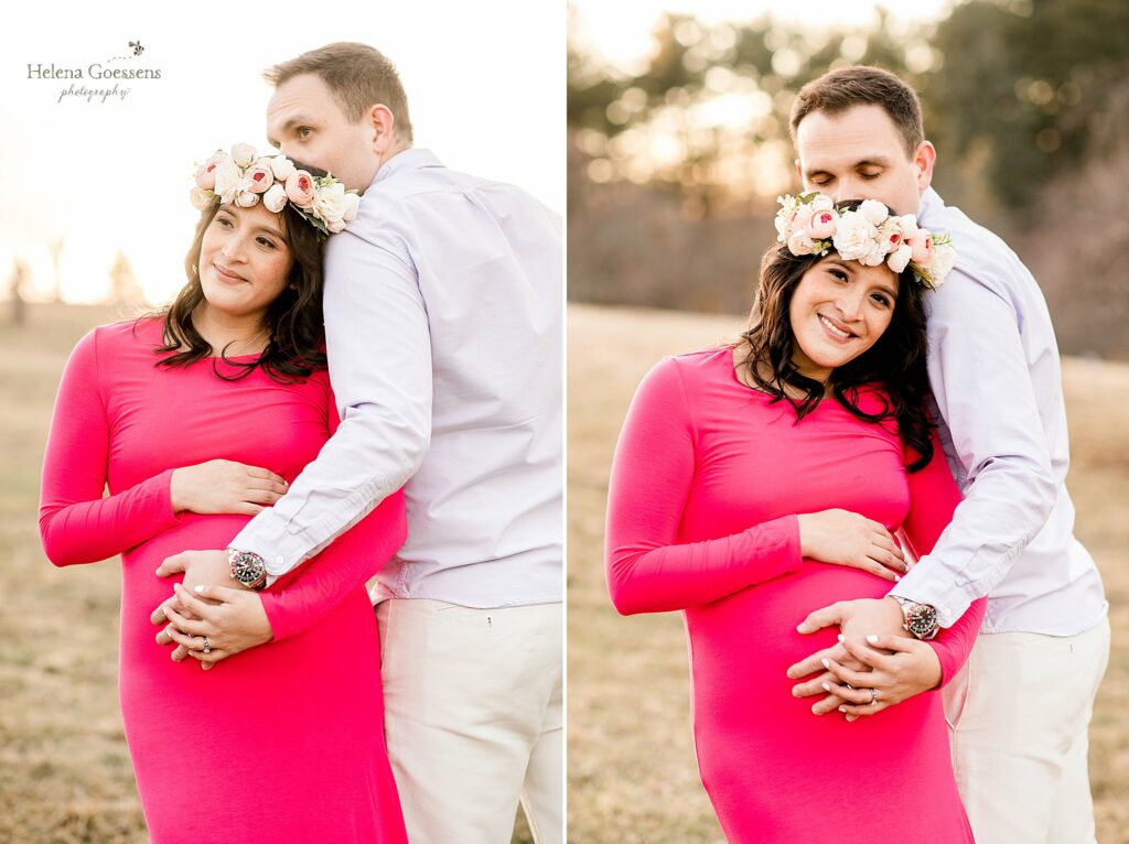 dad kissing mom in fuchsia dress and floral crown at Arnold's arboretum maternity session