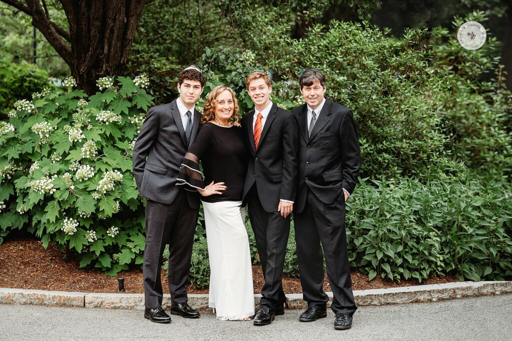 family poses together before Bar Mitzvah at the Temple Beth Avodah