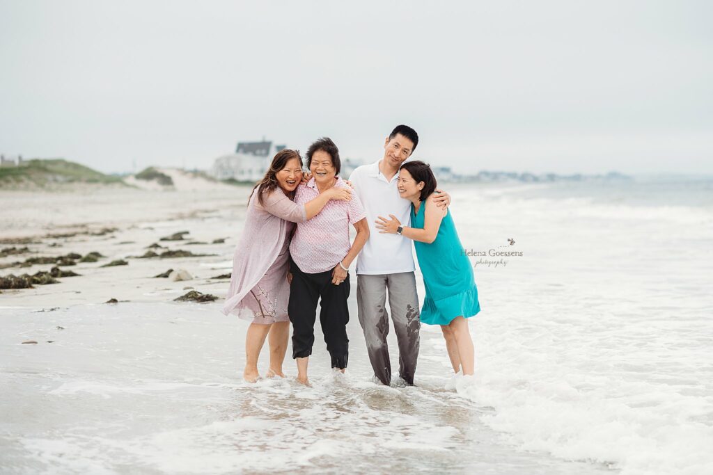 siblings hug mom during beach family photos in Marshfield MA