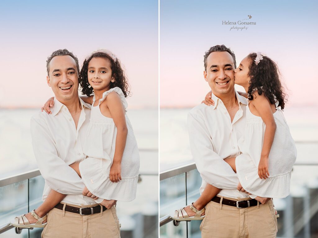 little girl hugs and kisses dad during family photos in Boston MA