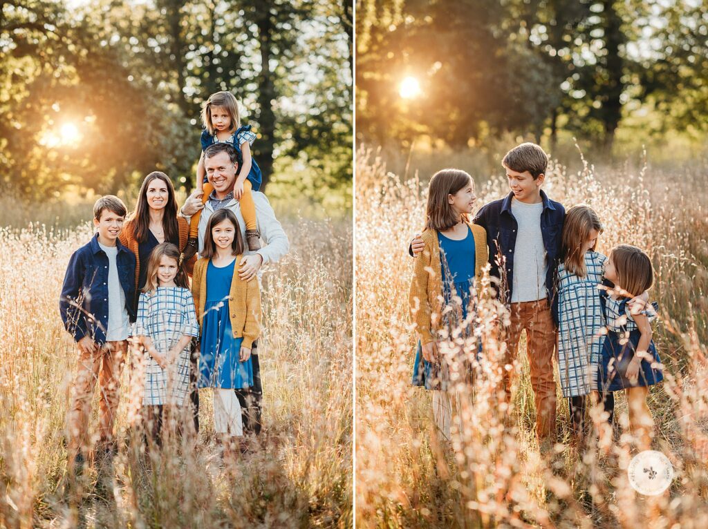 siblings hug in field during family portraits at the Old Manse