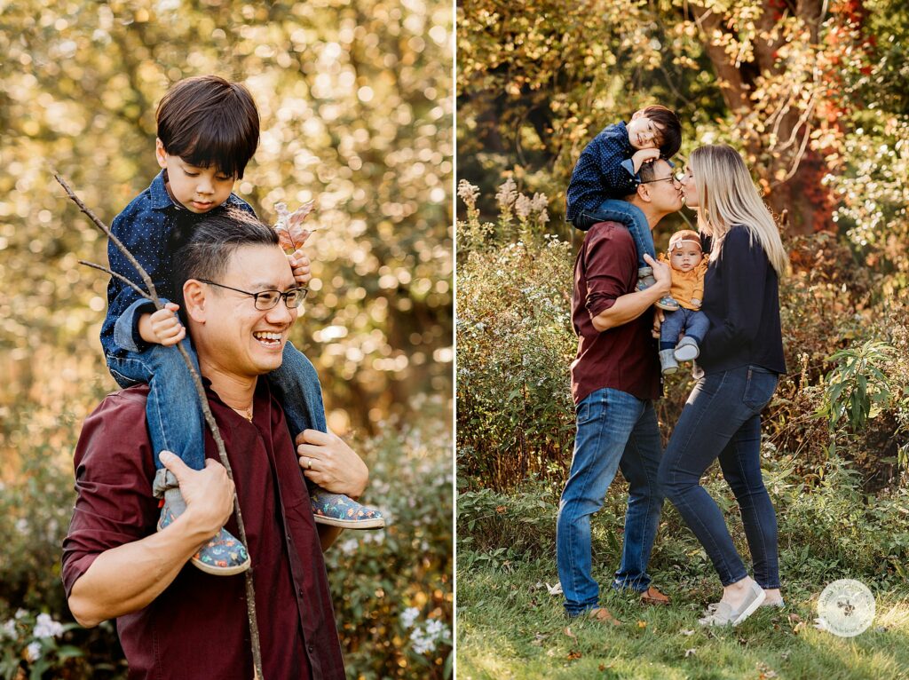 dad holds son on shoulders during fall Larz Anderson Park family photos