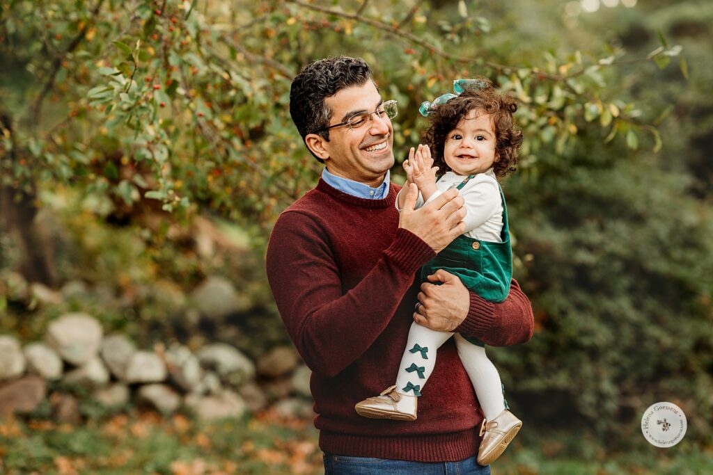 dad hugs daughter during Fall Bradley Estate Family Portraits