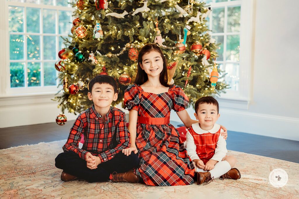 Weston MA Lifestyle Holiday Family Portraits for three children in red and black outfits 