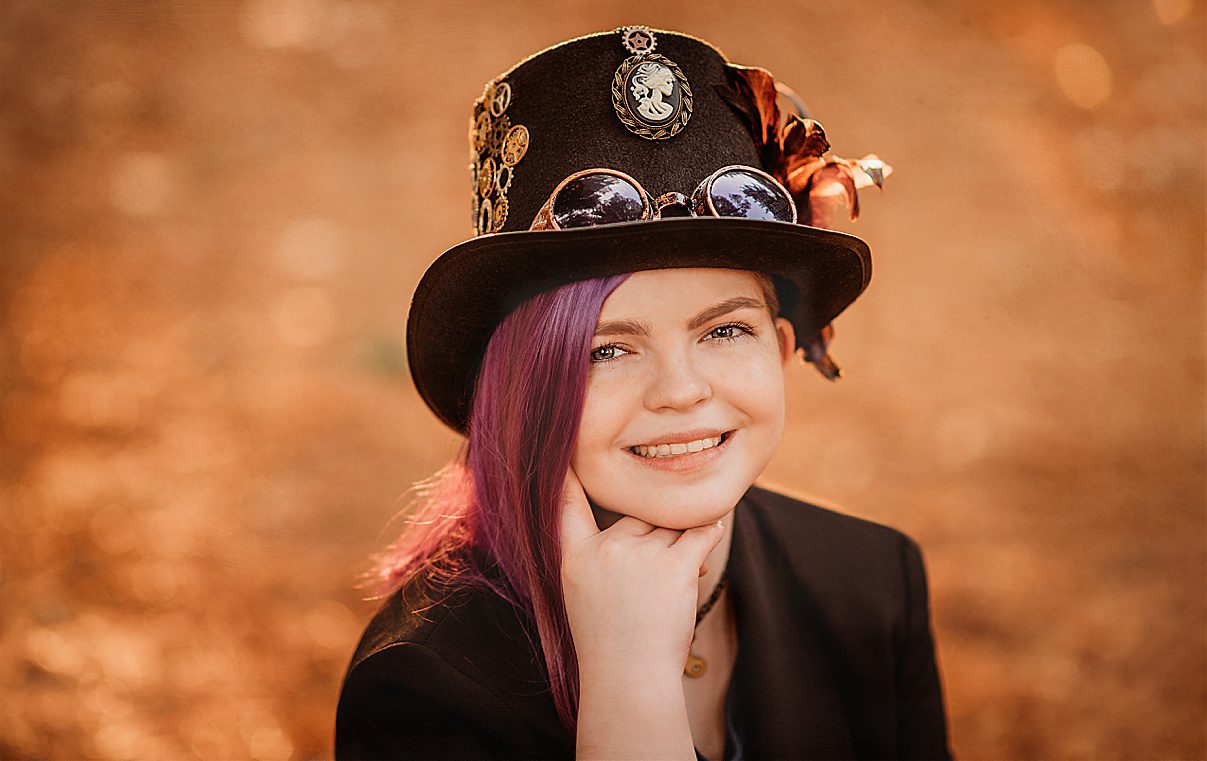 Arnold's Arboretum senior portraits for non-binary teen in custom hat