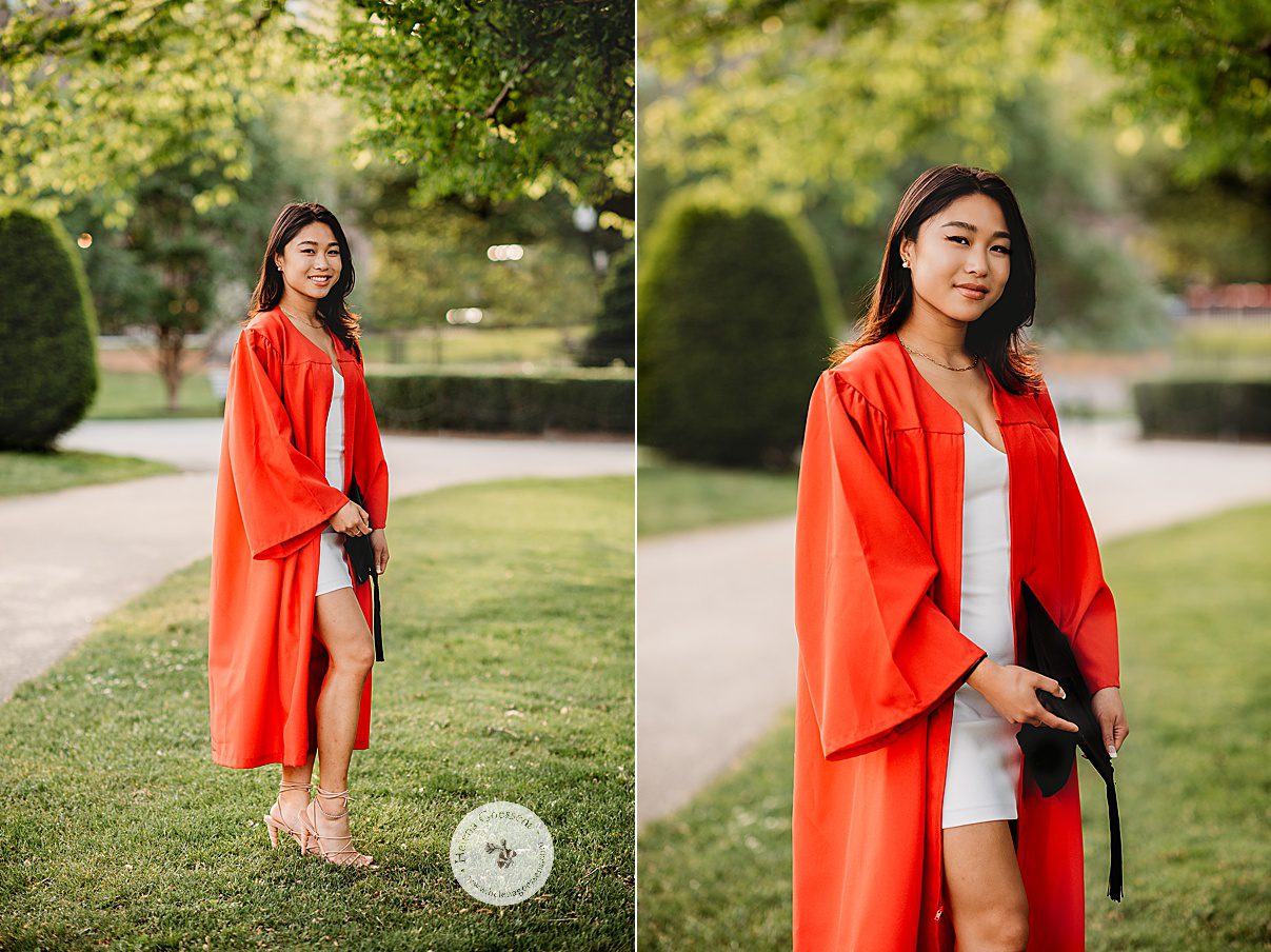 college senior poses in red robe with black hat during Boston University graduation portraits