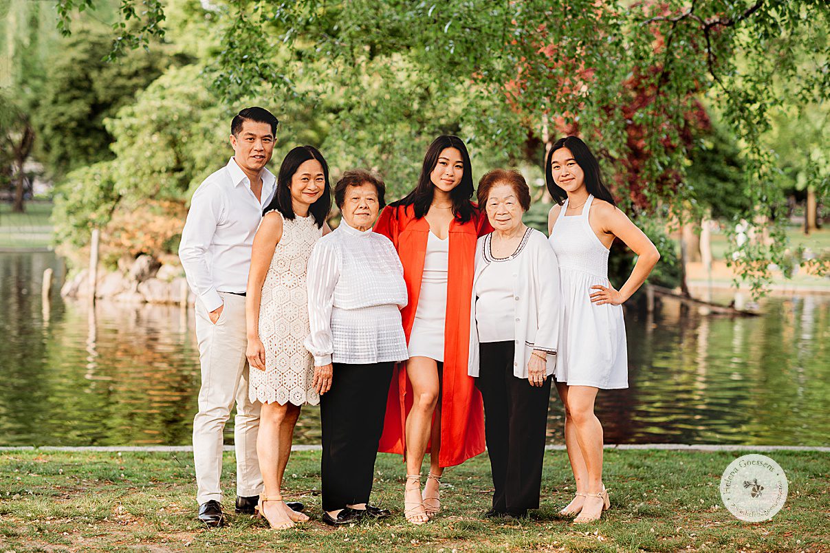 BU grad poses with parents, grandmothers, and sister during Boston University graduation portraits