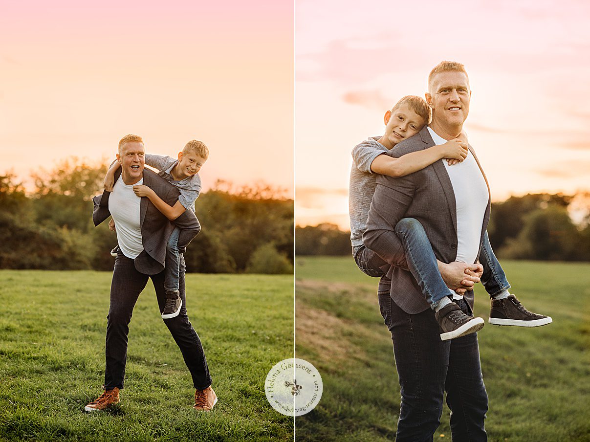 dad carries son during family photos in Larz Anderson Park at sunset 