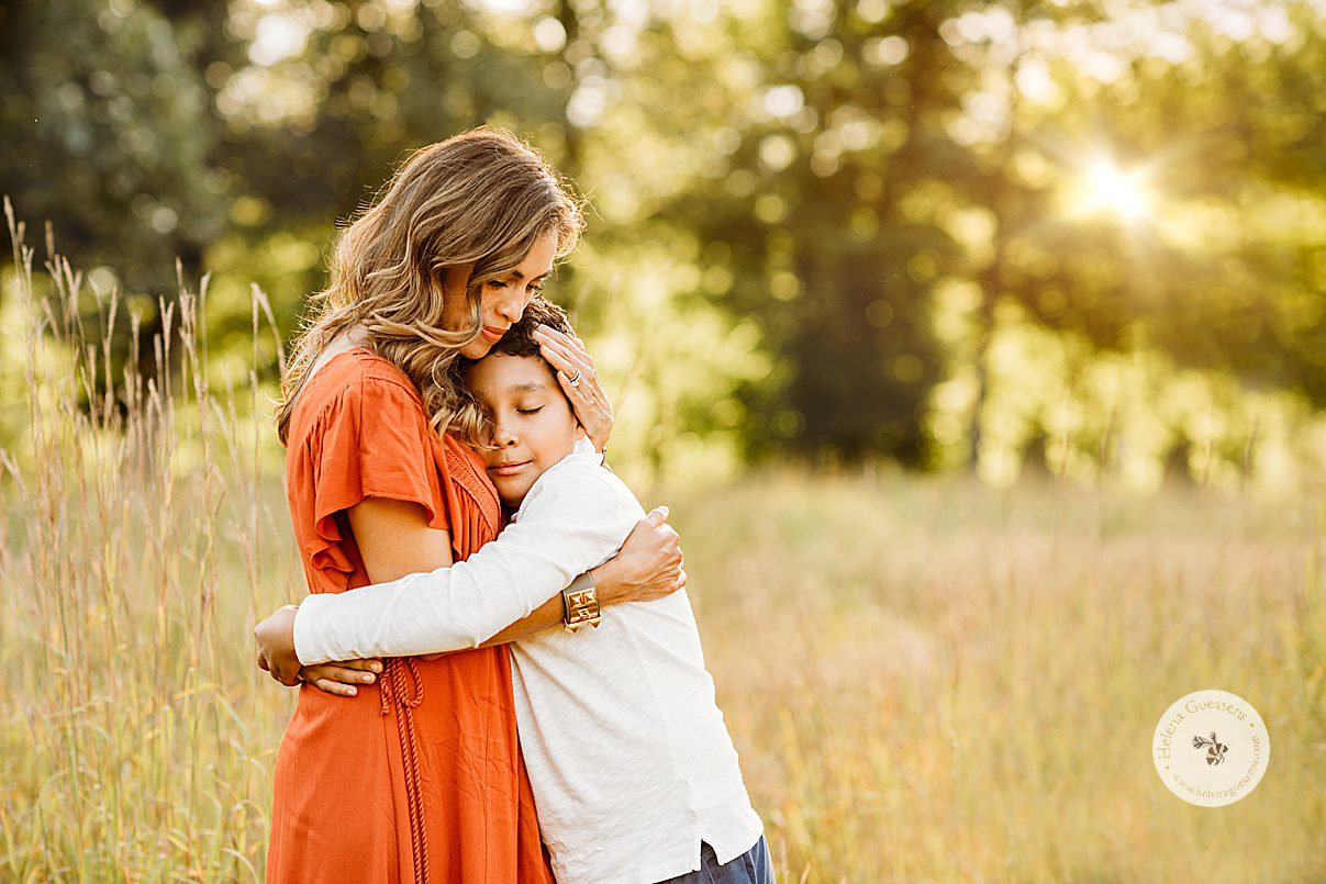 mother hugs son during Concord MA family portrait session in the fall