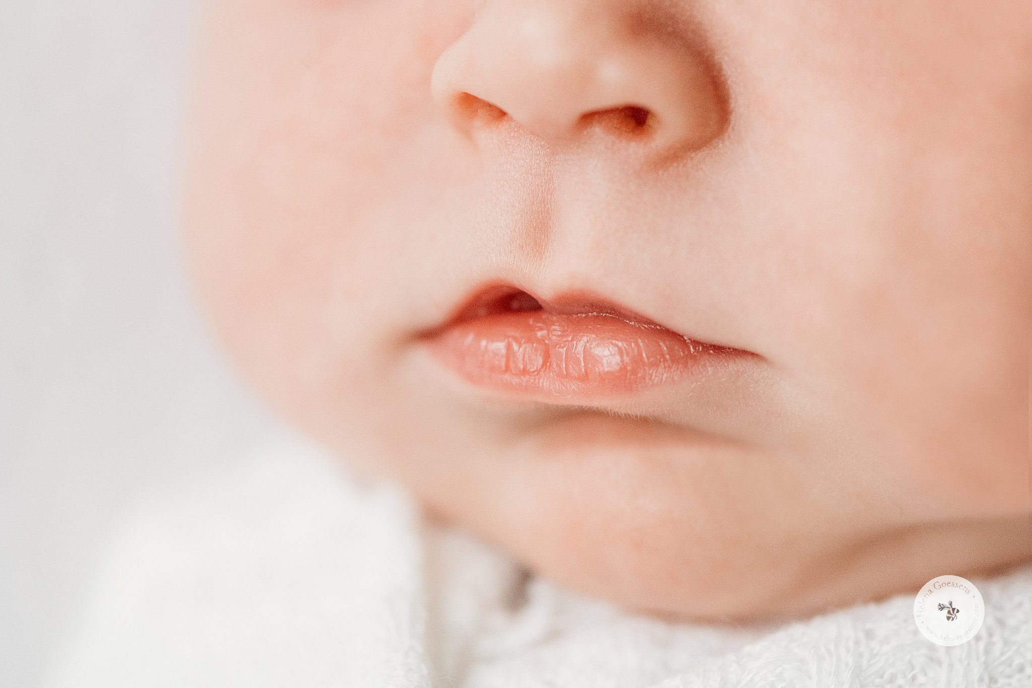 detail photo of baby's lips during lifestyle session 