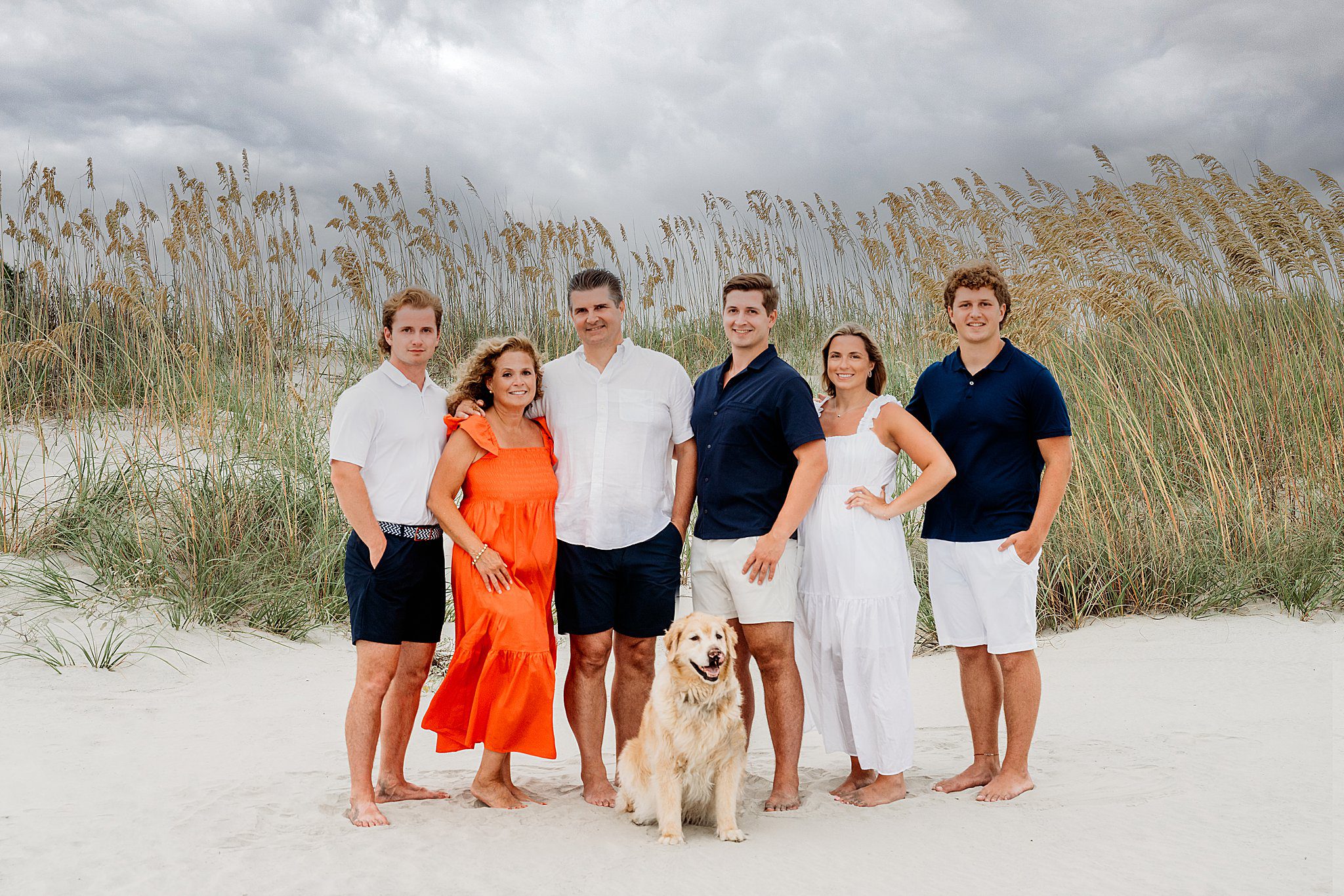 Boston Newborn and Family Photographer Helena Goessens Photography poses with family on beach on Seabrook Island 