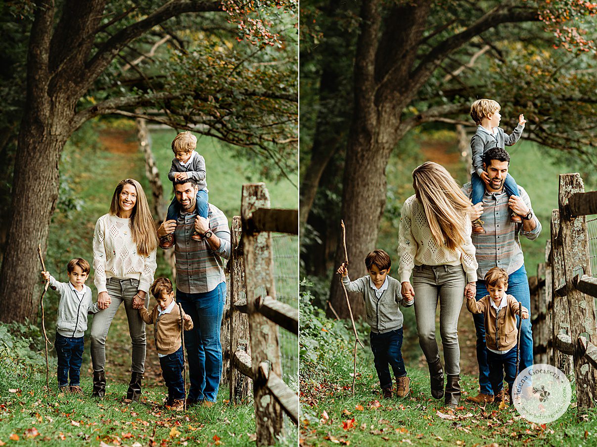 parents walk with sons and one son sits on dad's shoulder during fall family portraits at the Bradley Estate