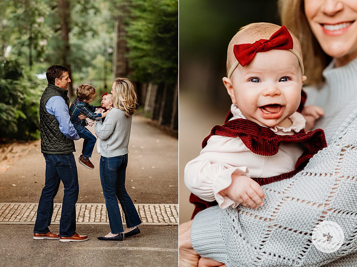 parents hold children while they reach for each other during fall family portraits at Wellesley College