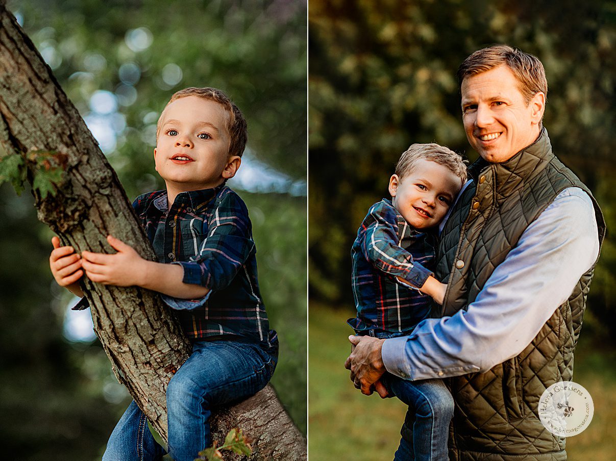 dad in long sleeve shirt and puffer vest hugs toddler son as he climbs tree in Wellesley MA
