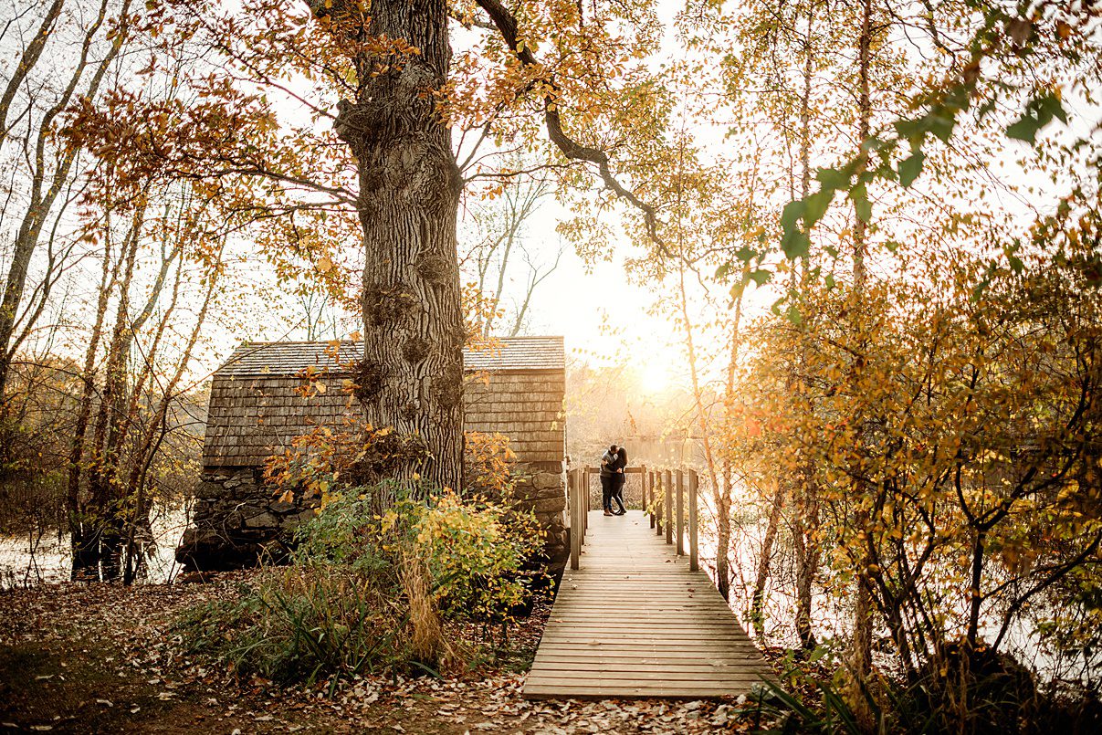 fall family portraits on dock outside the Old Manse