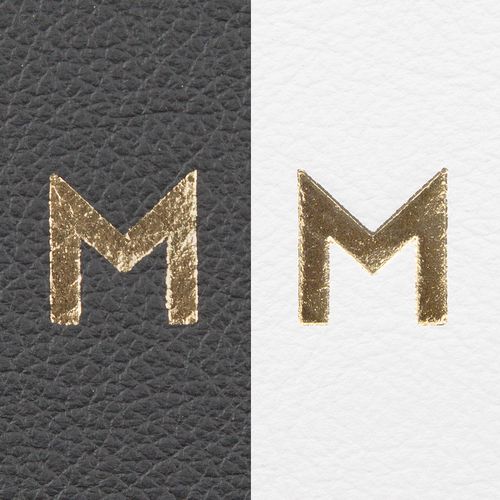 The image features a gold letter 